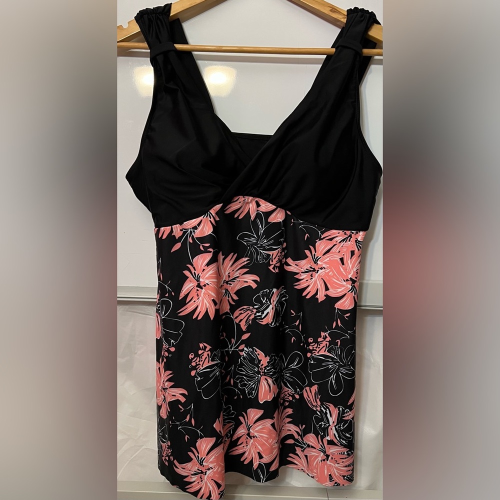 2PC Women’s black and peach floral swim set.